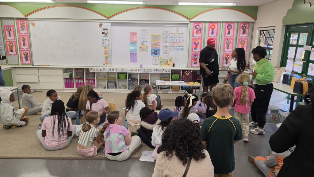 Children participating in interactive African history activities during the Brave, Bright & Brilliant