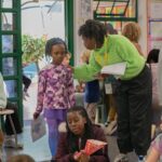 Children participating in interactive African history activities during the Brave, Bright & Brilliant