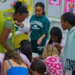 Children participating in interactive African history activities during the Brave, Bright & Brilliant