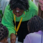 Author Tshireletso Moloi presenting Brave, Bright & Brilliant Women during the children’s programme session at the Kingsmead Book Fair 2026.