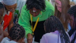 Author Tshireletso Moloi presenting Brave, Bright & Brilliant Women during the children’s programme session at the Kingsmead Book Fair 2026.